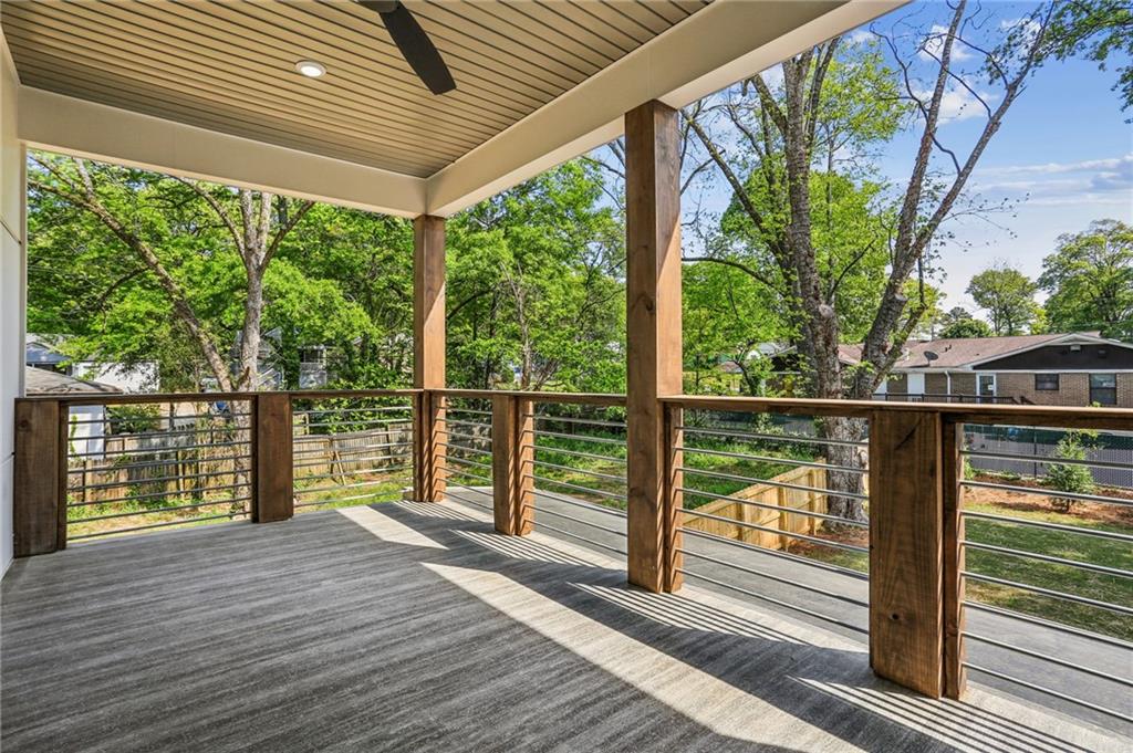 1312 Pine Avenue Atlanta, GA 30344 - Photo 16 of 17 a view of balcony with wooden floor