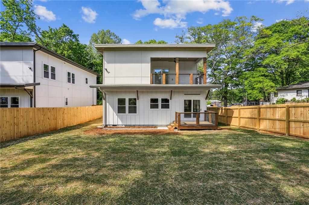 1312 Pine Avenue Atlanta, GA 30344 - Photo 17 of 17 a view of a house with a yard