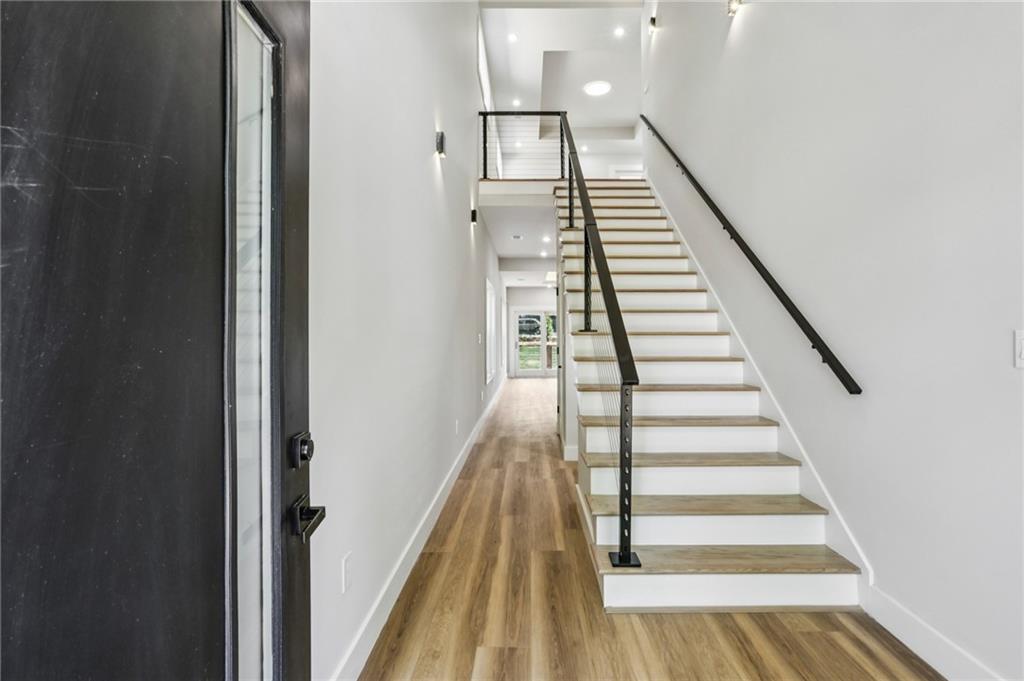 1312 Pine Avenue Atlanta, GA 30344 - Photo 6 of 17 a view of entryway and hall with wooden floor
