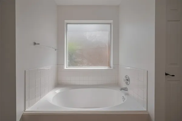 a bathroom with a bathtub