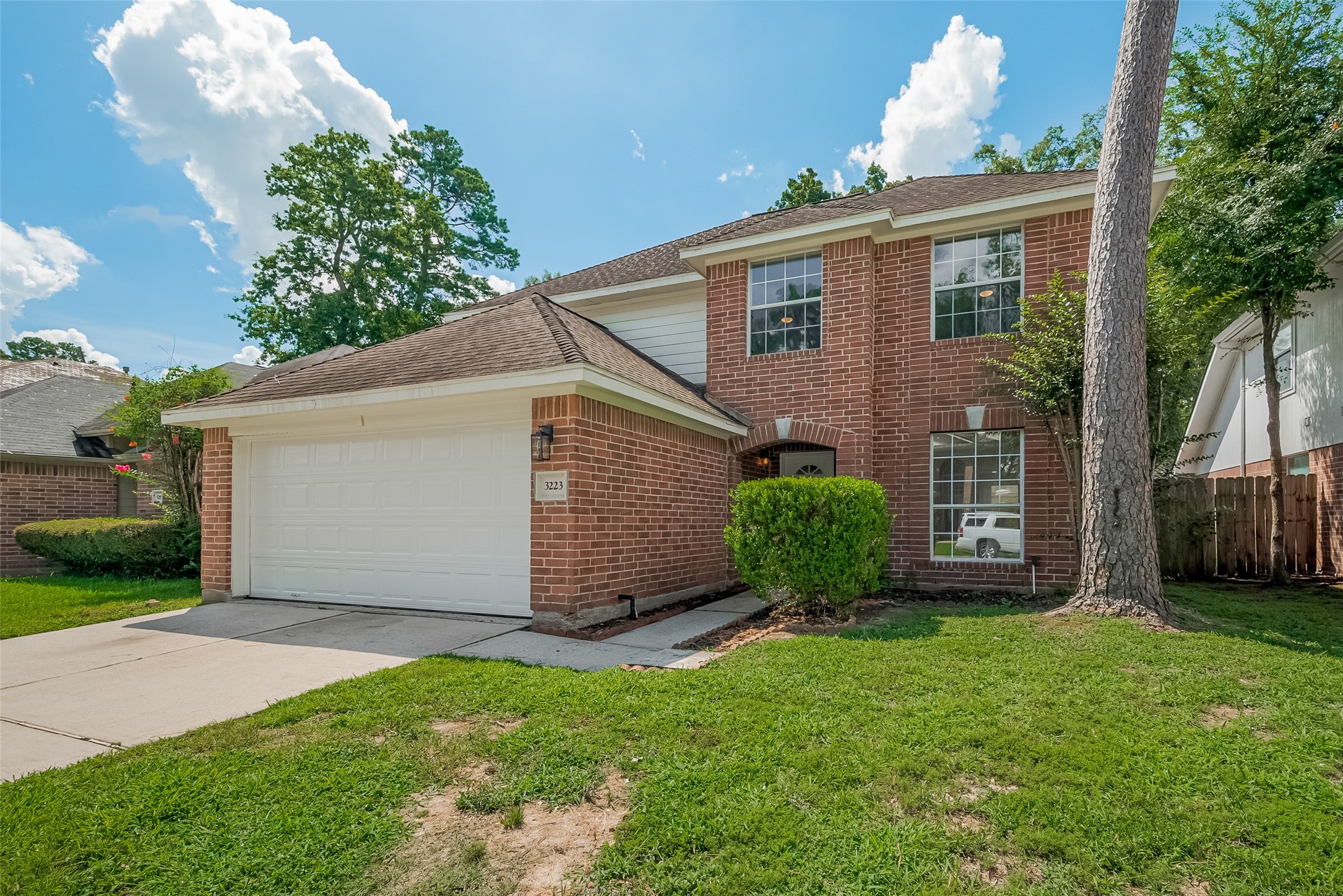 3223 Candlepine Drive Spring, TX 77388 - Photo 3 of 34 a view of a house with backyard and garden