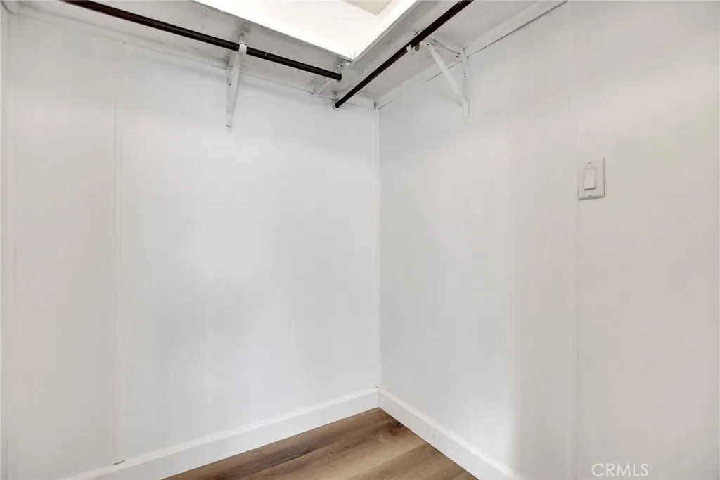 840 Foothill, Unit 27 Azusa, CA 91702 - Photo 26 of 30 a view of a room with racks on the wall