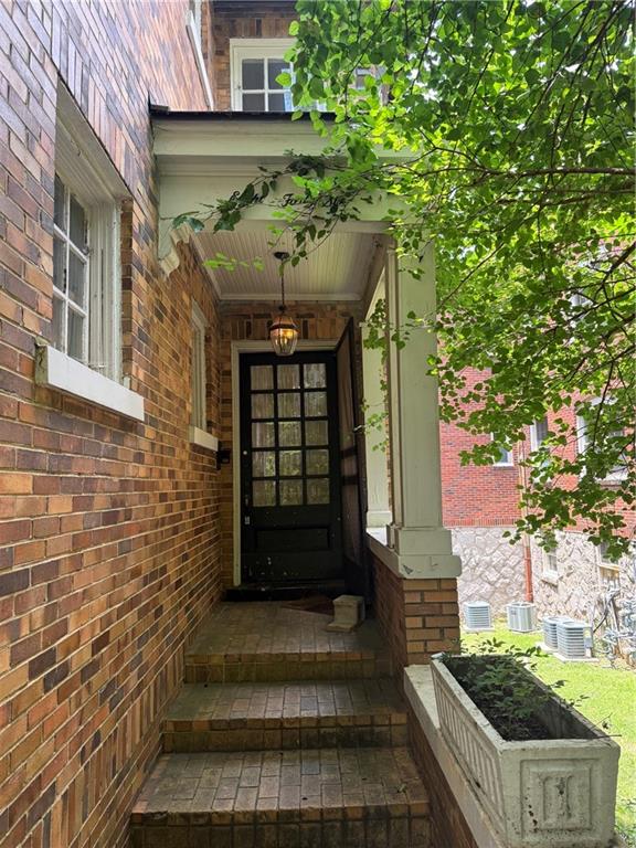 846 Briarcliff Road Northeast Atlanta, GA 30306 - Photo 2 of 22 a front view of a house with a yard