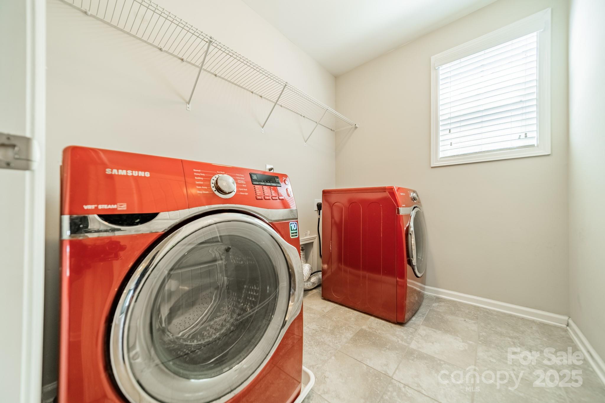 9229 Inverness Bay Road Charlotte, NC 28278 - Photo 19 of 41 a utility room with dryer and washer