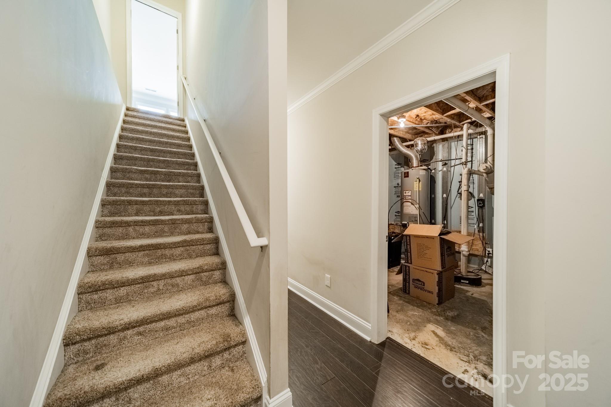 9229 Inverness Bay Road Charlotte, NC 28278 - Photo 23 of 41 a view of a hallway with wooden floor and entryway