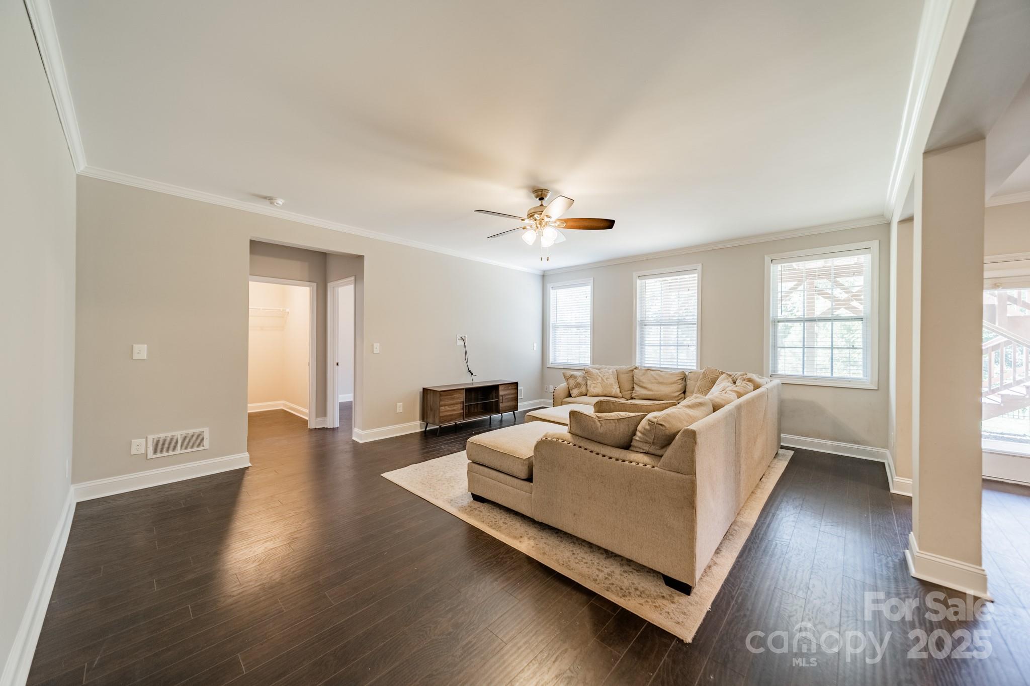 9229 Inverness Bay Road Charlotte, NC 28278 - Photo 25 of 41 a living room with furniture and a large window