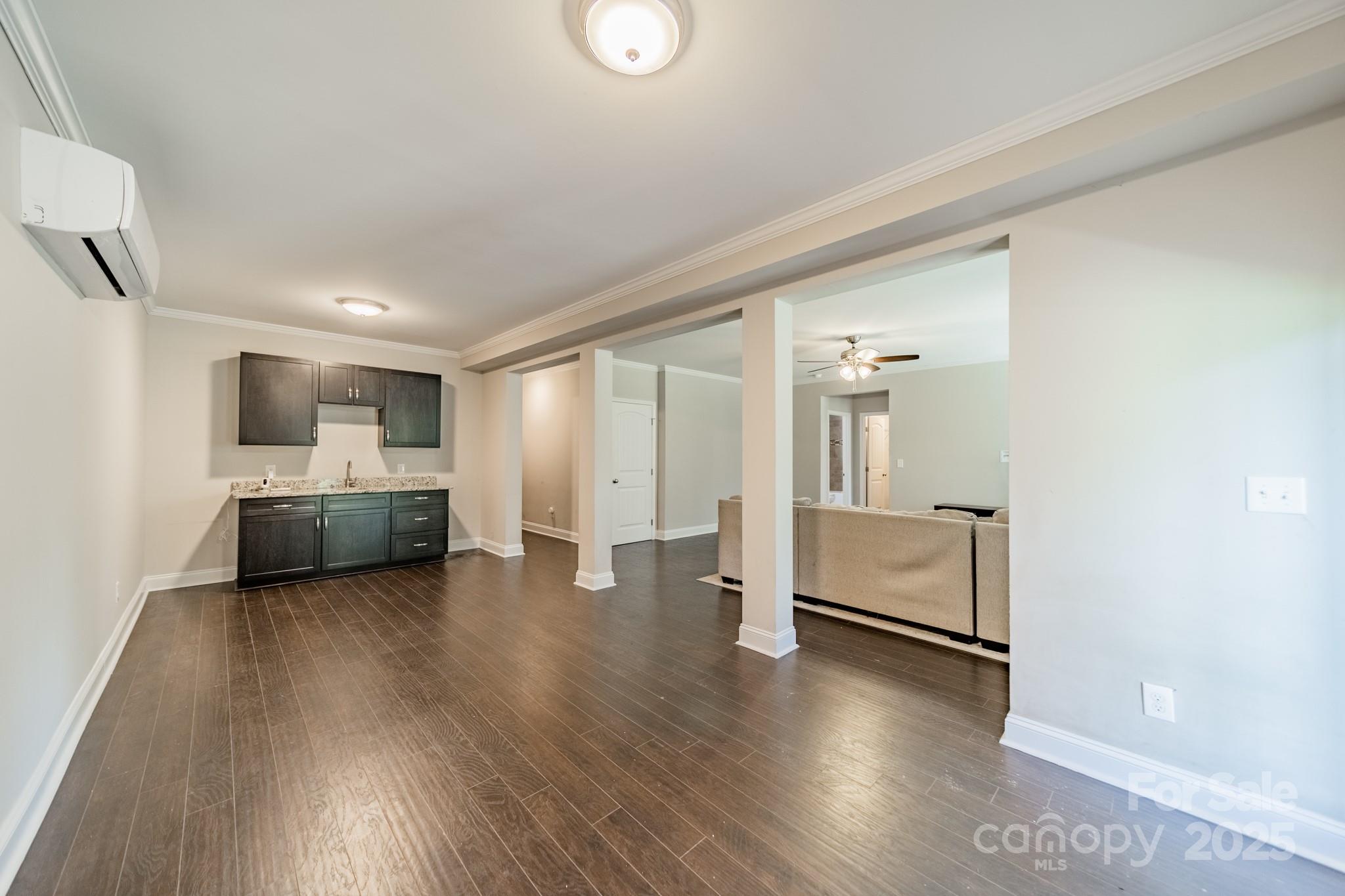 9229 Inverness Bay Road Charlotte, NC 28278 - Photo 26 of 41 a view of living room with furniture and wooden floor