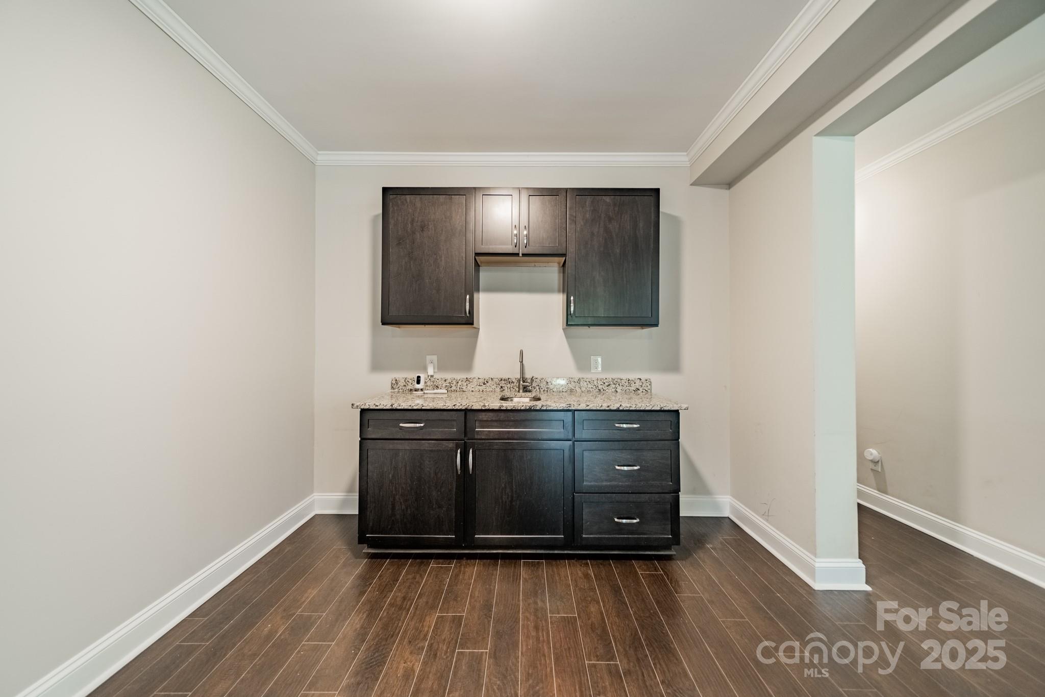 9229 Inverness Bay Road Charlotte, NC 28278 - Photo 27 of 41 a view of kitchen with granite countertop window and wooden floor