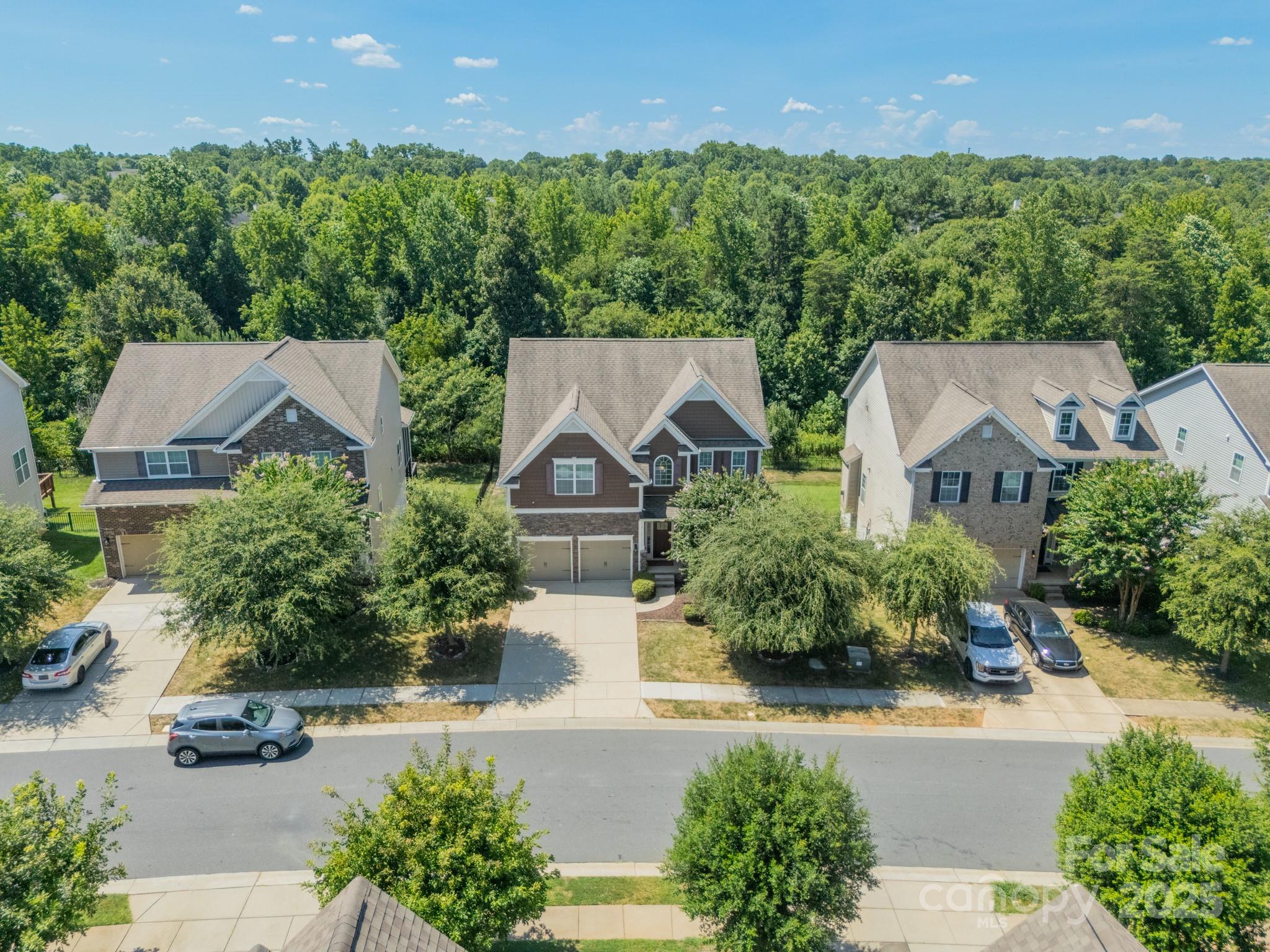9229 Inverness Bay Road Charlotte, NC 28278 - Photo 39 of 41 an aerial view of a house with a garden and a yard