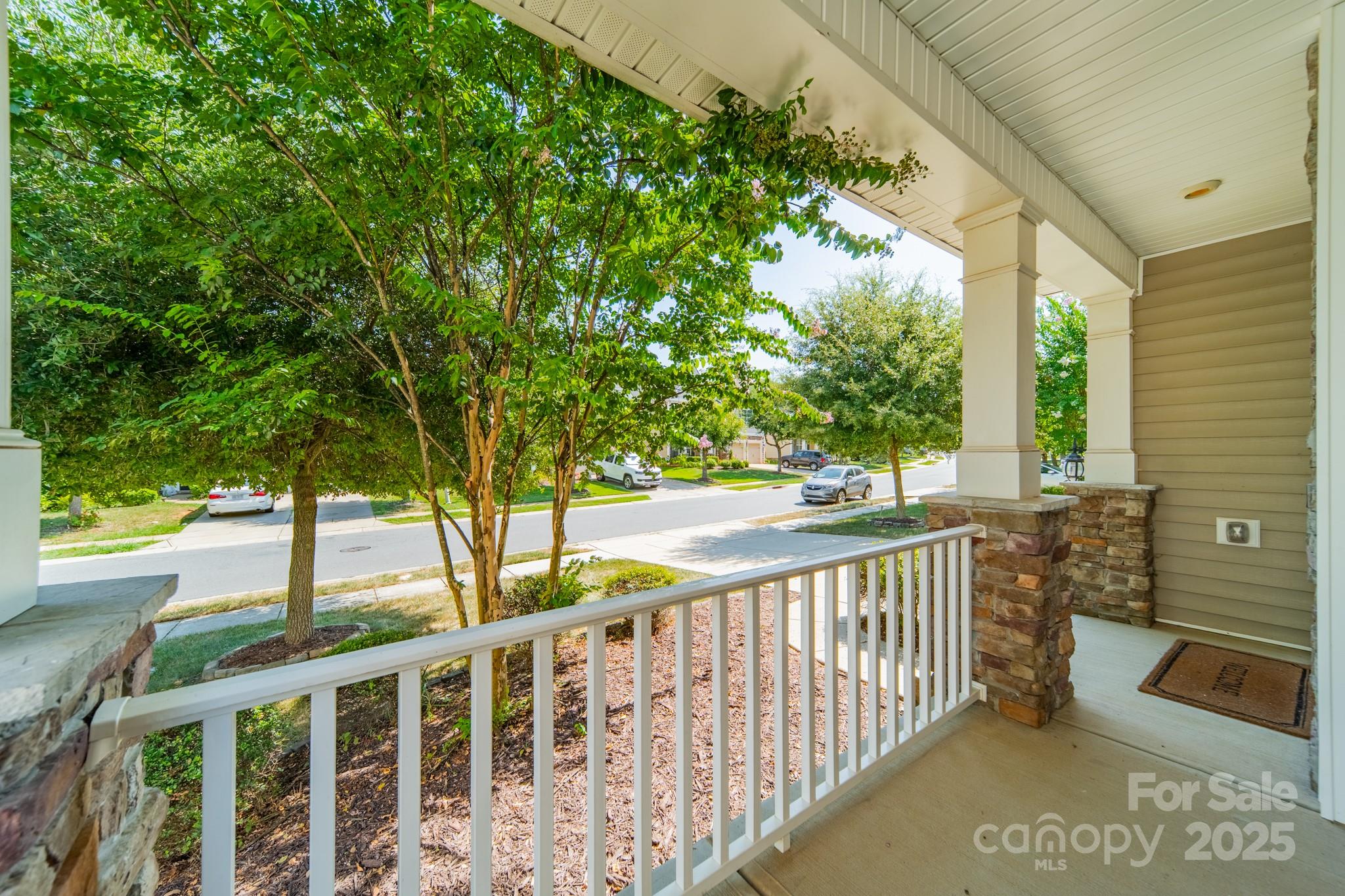 9229 Inverness Bay Road Charlotte, NC 28278 - Photo 4 of 41 a view of a balcony with trees