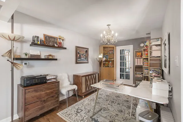 a kitchen with stainless steel appliances granite countertop a stove and cabinets