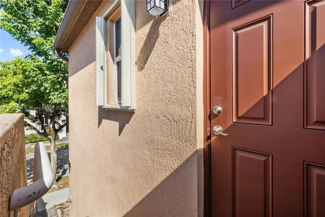 a view of balcony with furniture