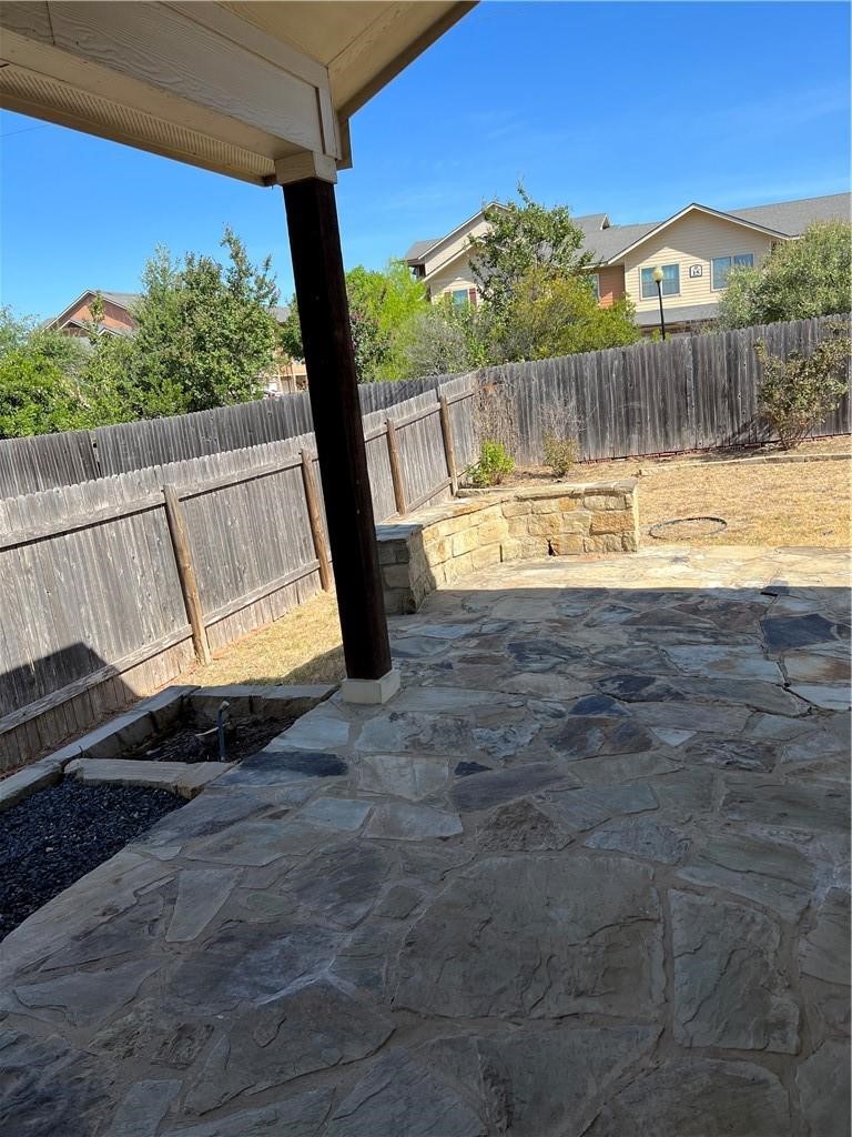 3645 Rams Horn Way Round Rock, TX 78665 - Photo 14 of 16 Fenced backyard with a patio