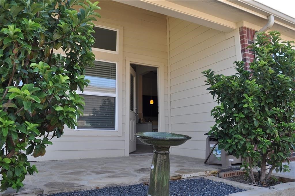 3645 Rams Horn Way Round Rock, TX 78665 - Photo 16 of 16 View of exterior entry featuring brick siding