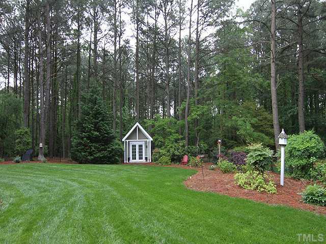 4636 Hidden Harbor Lane Raleigh, NC 27615 - Photo 11 of 16 Lush landscaping and charming Garden Shed make this flat, fenced back yard a true delight. Property line extends beyond limits of the fencing.