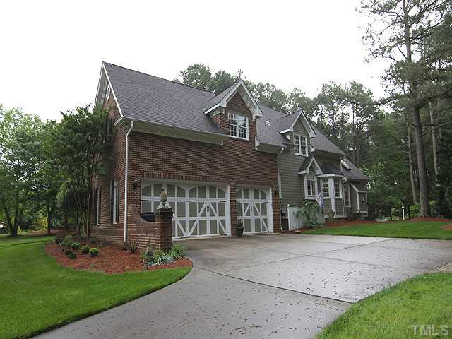 4636 Hidden Harbor Lane Raleigh, NC 27615 - Photo 13 of 16 Three - Car Garage plus a long Semi-Circular Driveway in the front. Lots of parking for your guests.