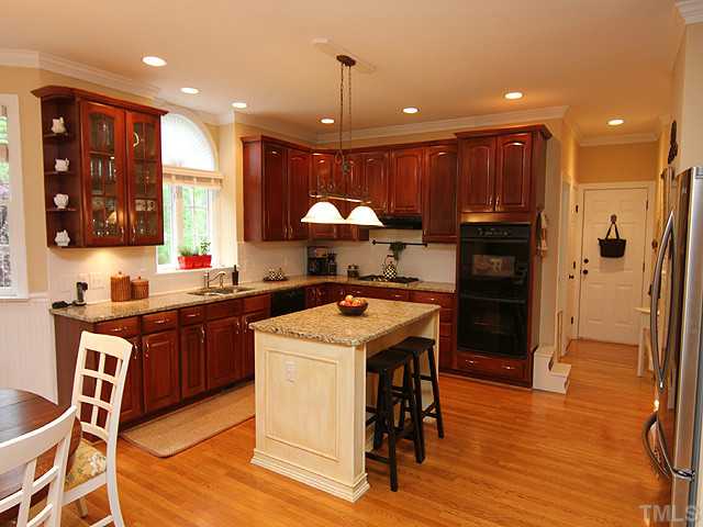 4636 Hidden Harbor Lane Raleigh, NC 27615 - Photo 4 of 16 View of Kitchen from Breakfast Room and Den. Great Open - Plan Layout
