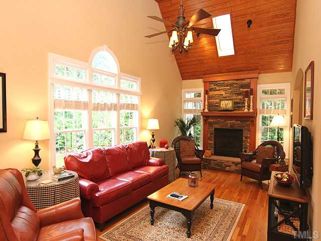 4636 Hidden Harbor Lane Raleigh, NC 27615 - Photo 6 of 16 Fantasitc Family Room with Stone Fireplace, Vaulted Ceiling, great view of back yard, opens to Deck and Kitchen