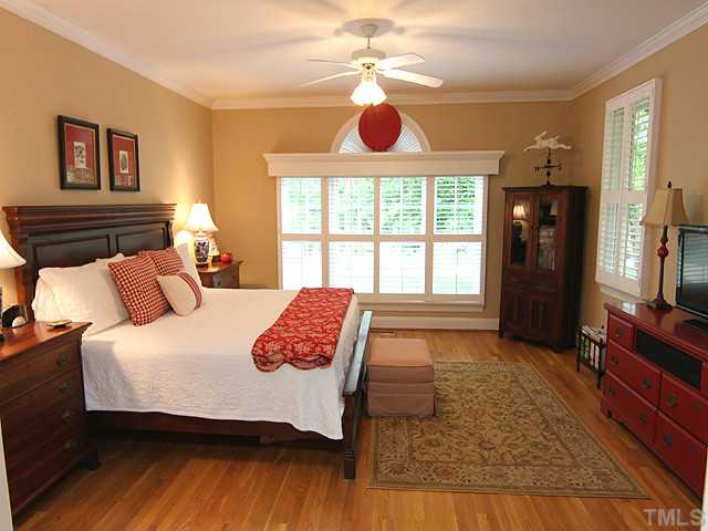4636 Hidden Harbor Lane Raleigh, NC 27615 - Photo 7 of 16 Large First - Floor Master Bedroon is filled with light.