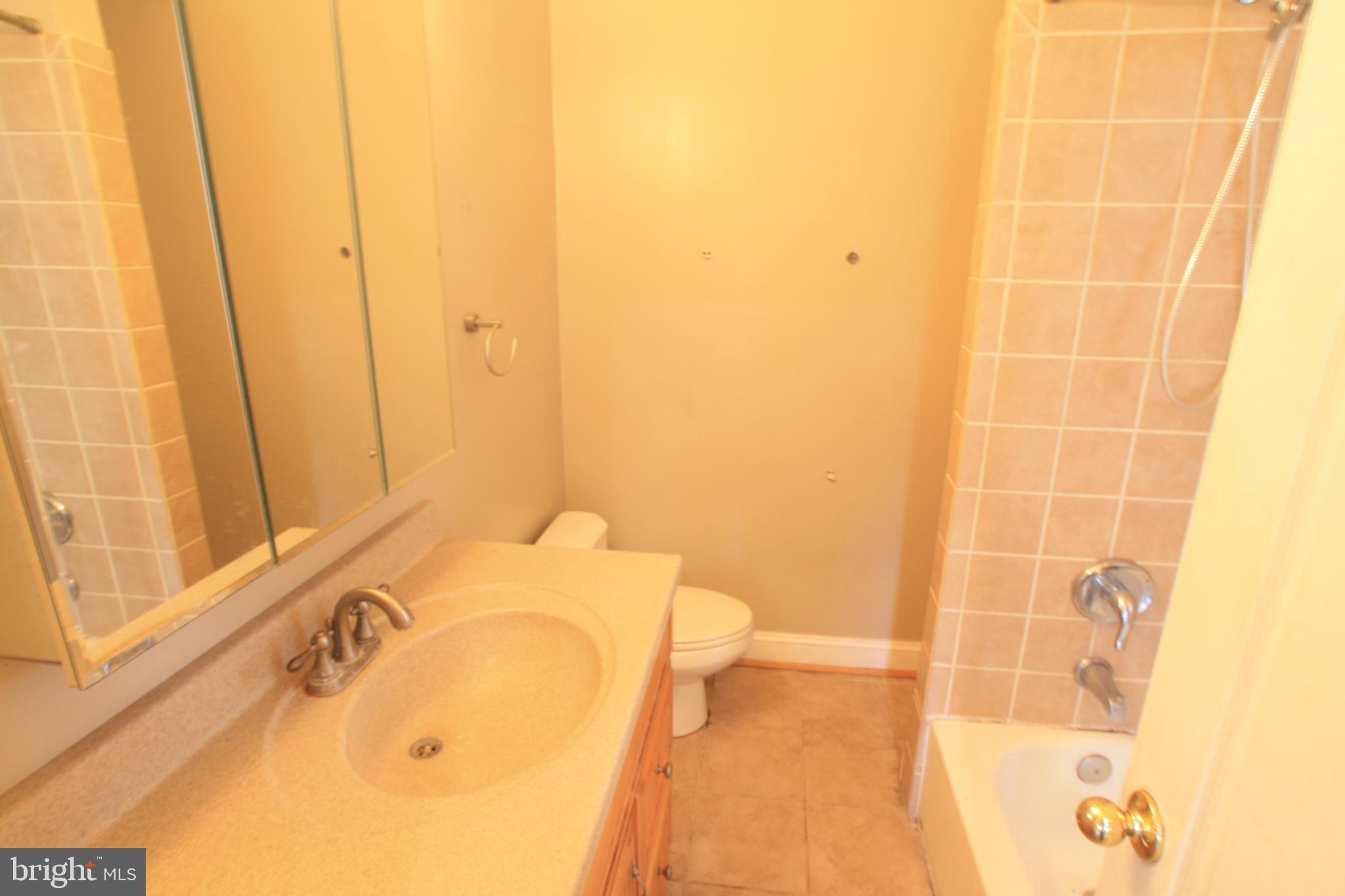 1119 45th Street Northeast Washington, DC 20019 - Photo 16 of 24 Cozy bathroom with modern fixtures.