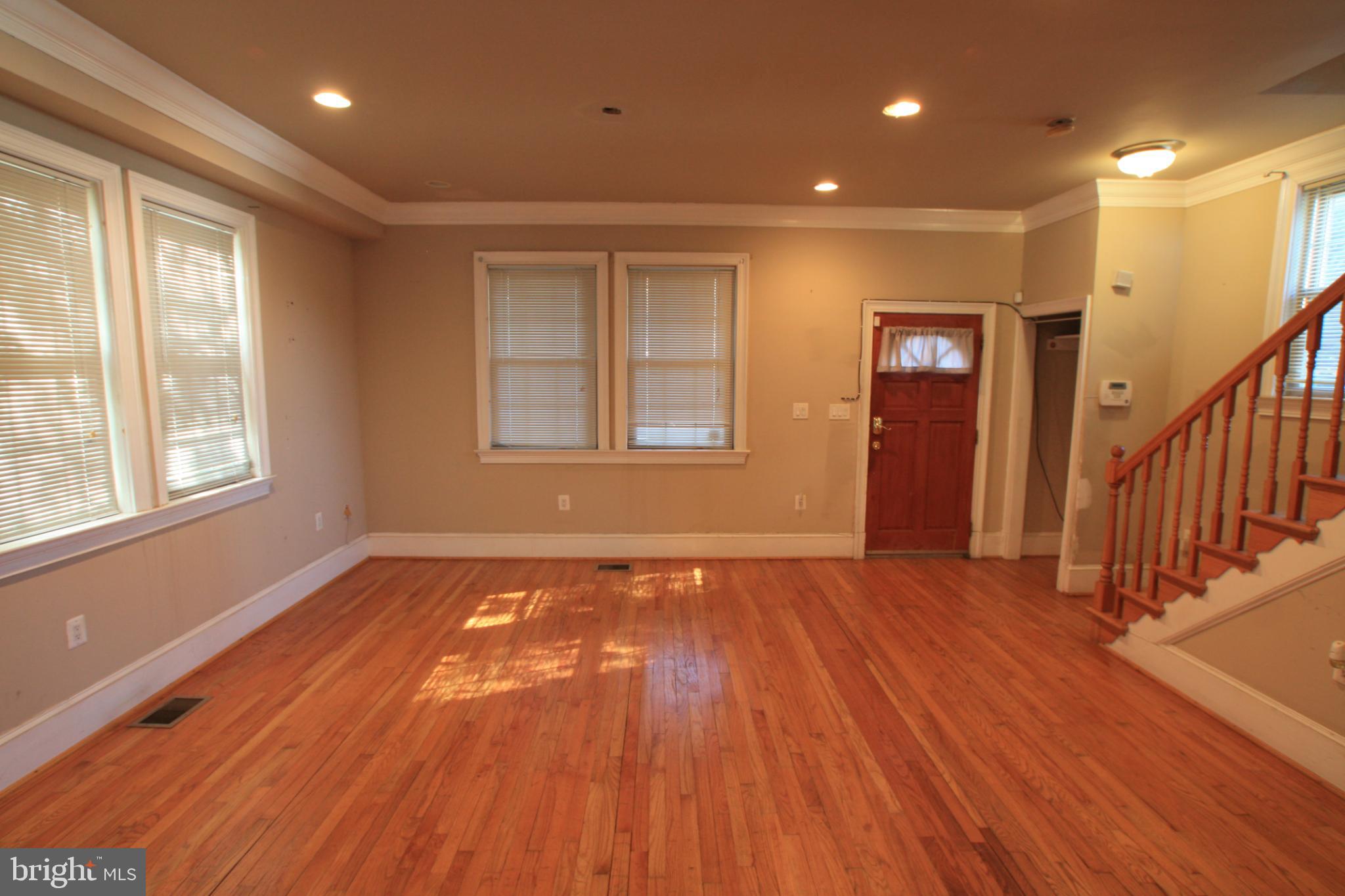 1119 45th Street Northeast Washington, DC 20019 - Photo 9 of 24 Spacious living area with natural light.