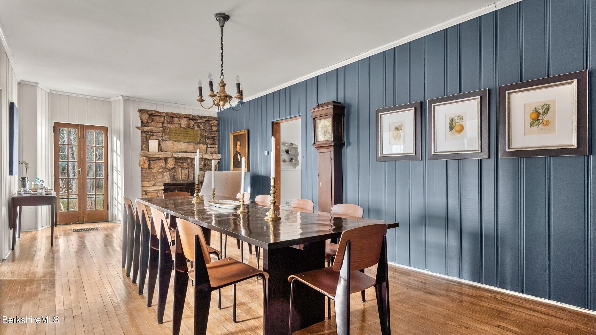 9 Brace Road Tyringham, MA 01264 - Photo 12 of 27 a view of a dining room with furniture window and wooden floor