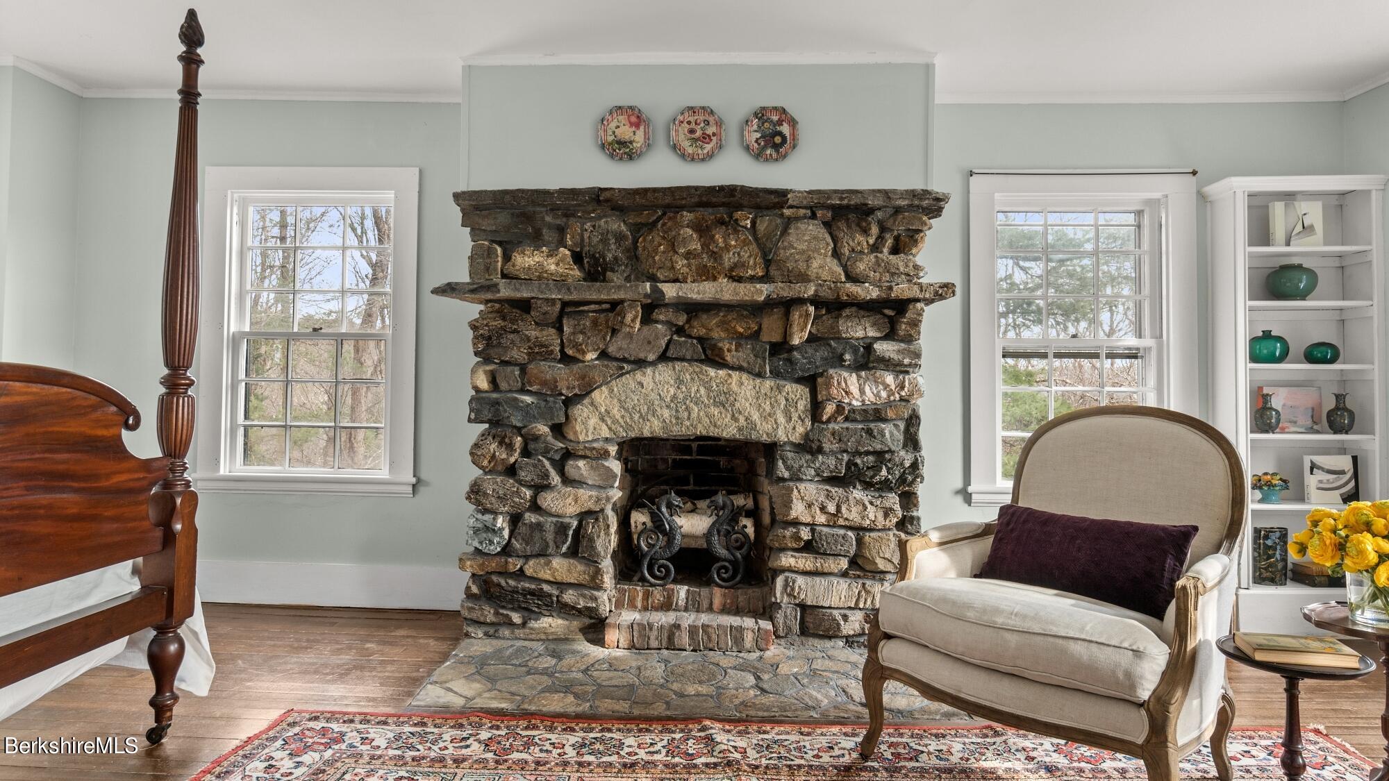 9 Brace Road Tyringham, MA 01264 - Photo 20 of 27 a living room with furniture a window and a fireplace