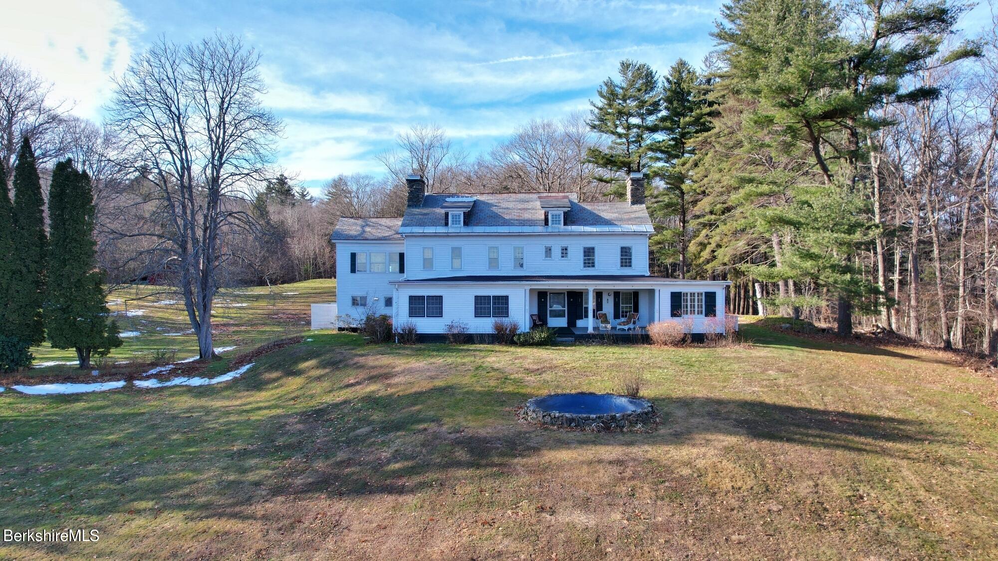 9 Brace Road Tyringham, MA 01264 - Photo 25 of 27 a view of a house with a yard