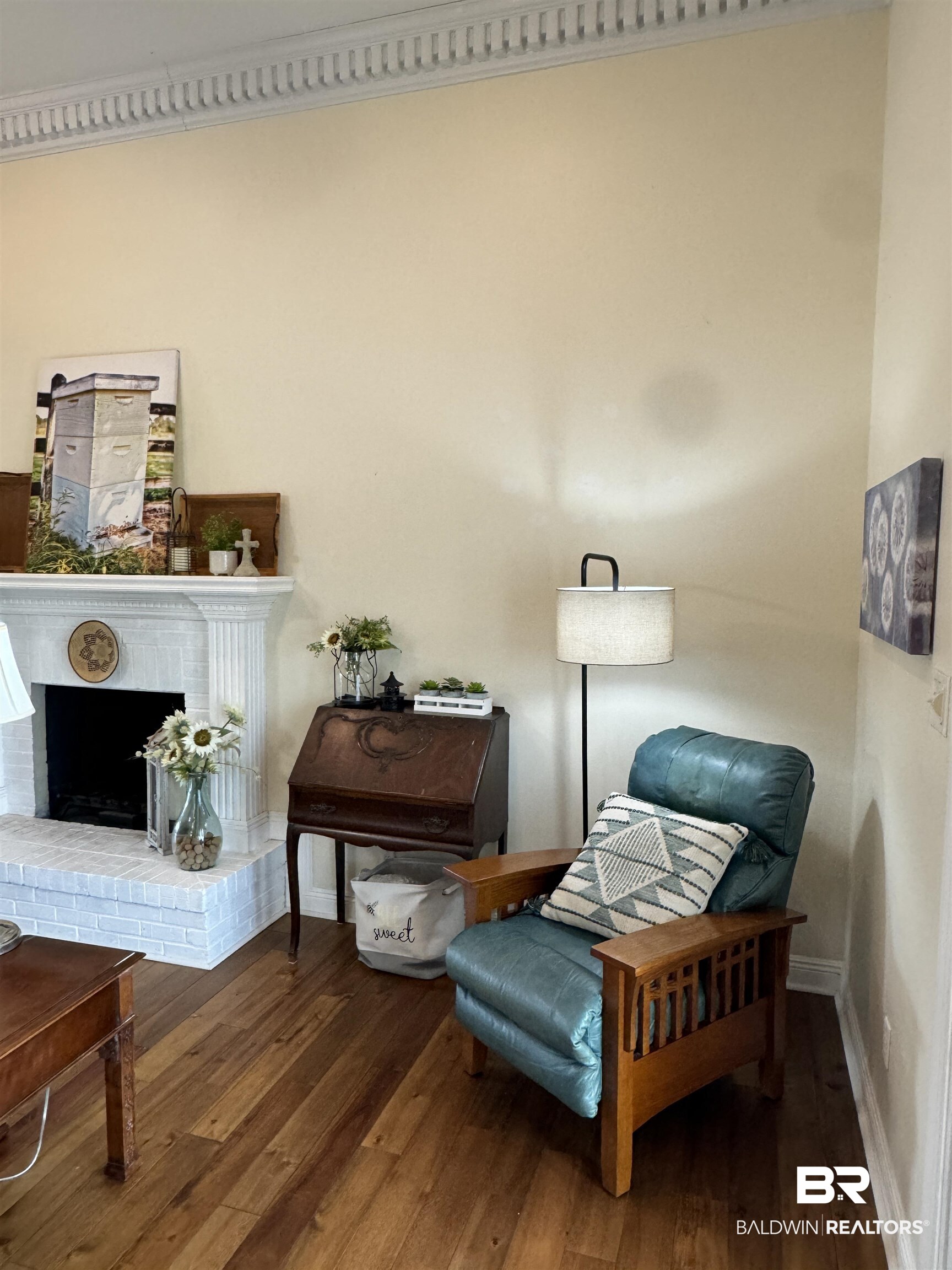 15165 Daugherty Road Foley, AL 36535 - Photo 14 of 70 Sitting room with a brick fireplace and hardwood / wood-style floors