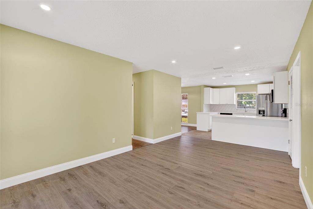 2340 Merrily Circle South Seffner, FL 33584 - Photo 11 of 52 a view of a kitchen with wooden floor and a sink