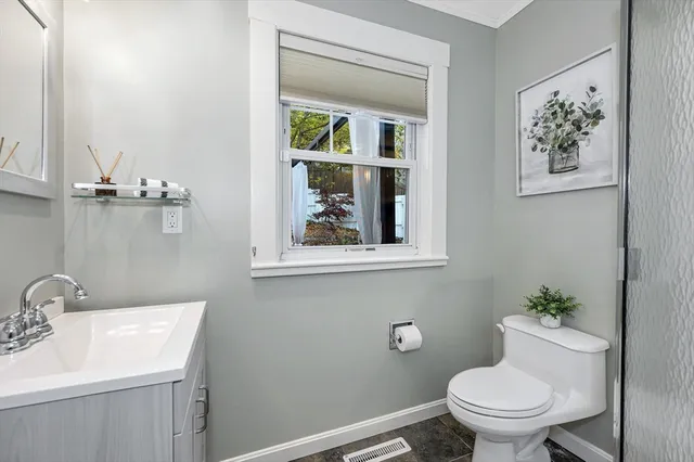 a view of a hallway with washer and dryer