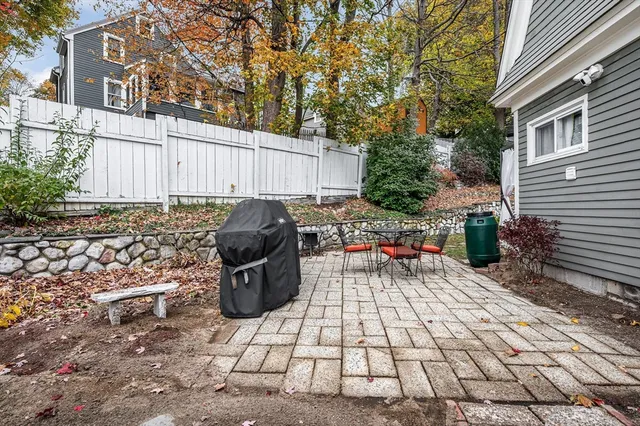 a view of street with small buildings