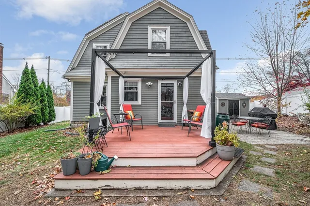 a view of a chairs and table in the patio