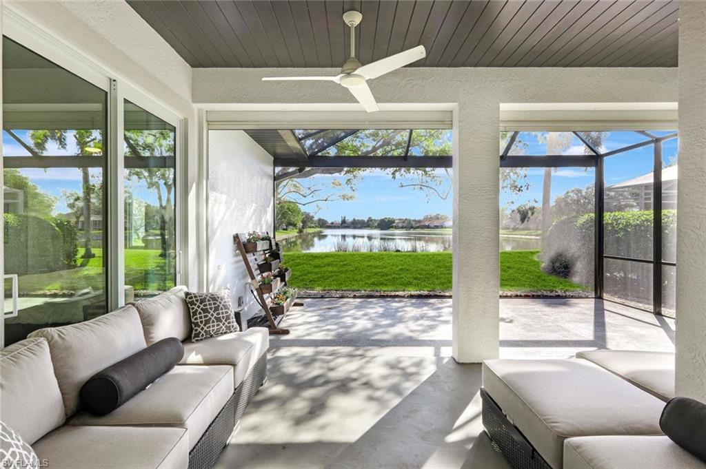 6900 Lone Oak Boulevard Naples, FL 34109 - Photo 14 of 23 a living room with a garden
