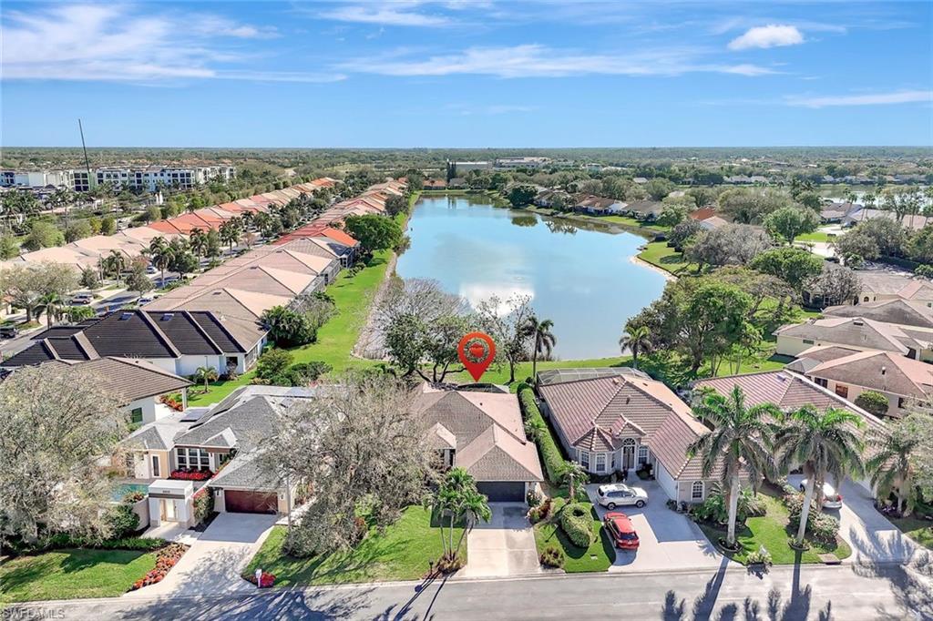 6900 Lone Oak Boulevard Naples, FL 34109 - Photo 19 of 23 a view of lake and city