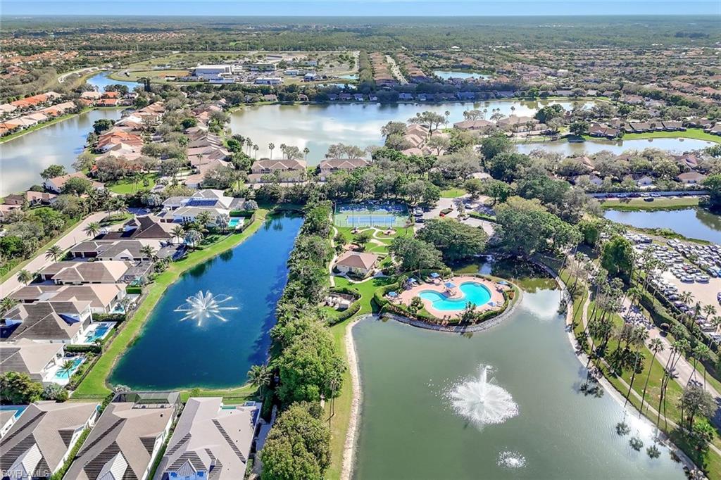 6900 Lone Oak Boulevard Naples, FL 34109 - Photo 20 of 23 an aerial view of residential houses with outdoor space