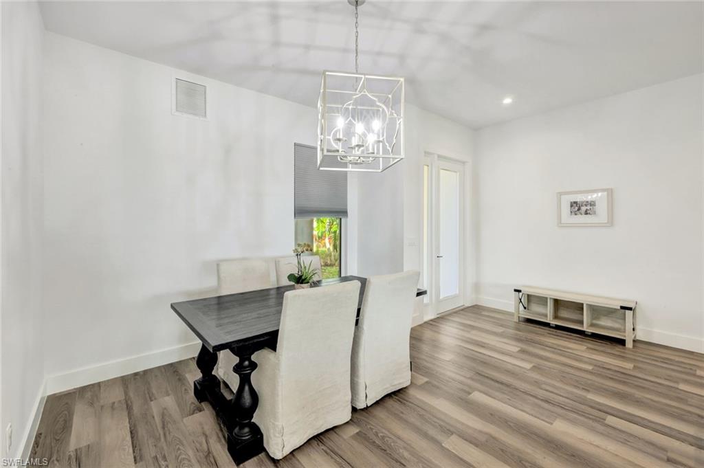 6900 Lone Oak Boulevard Naples, FL 34109 - Photo 4 of 23 a view of a livingroom with furniture and window