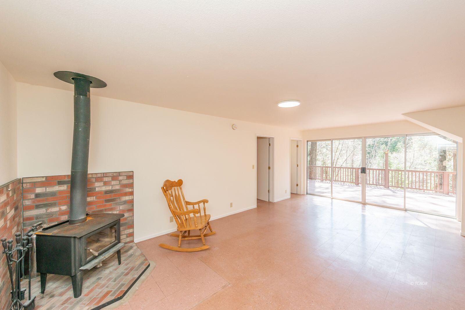 121-141 Mountain Aire Road Trinity Center, CA 96091 - Photo 17 of 51 a view of an empty room with a window