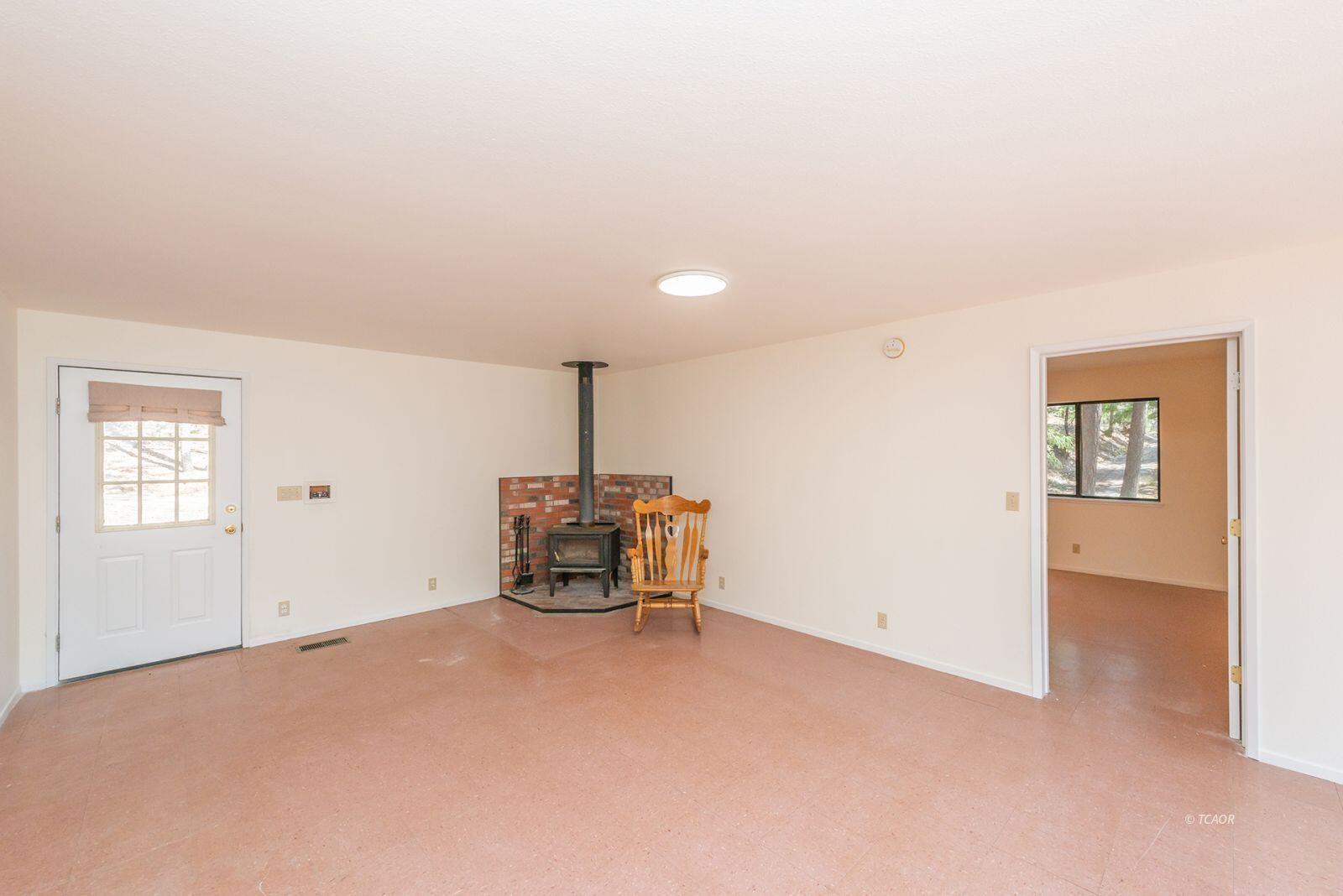 121-141 Mountain Aire Road Trinity Center, CA 96091 - Photo 25 of 51 a view of an empty room with a window