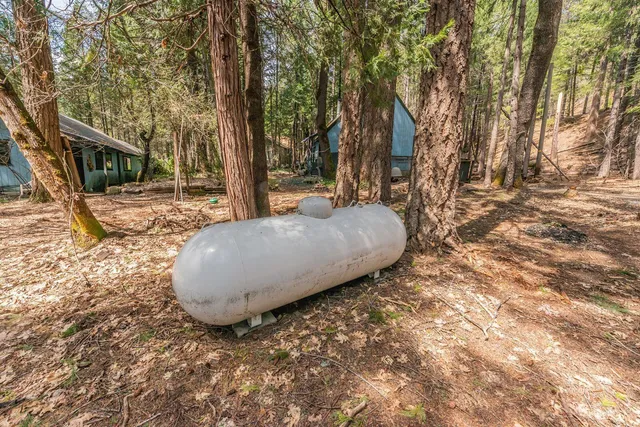 a view of a house with a snow in the yard