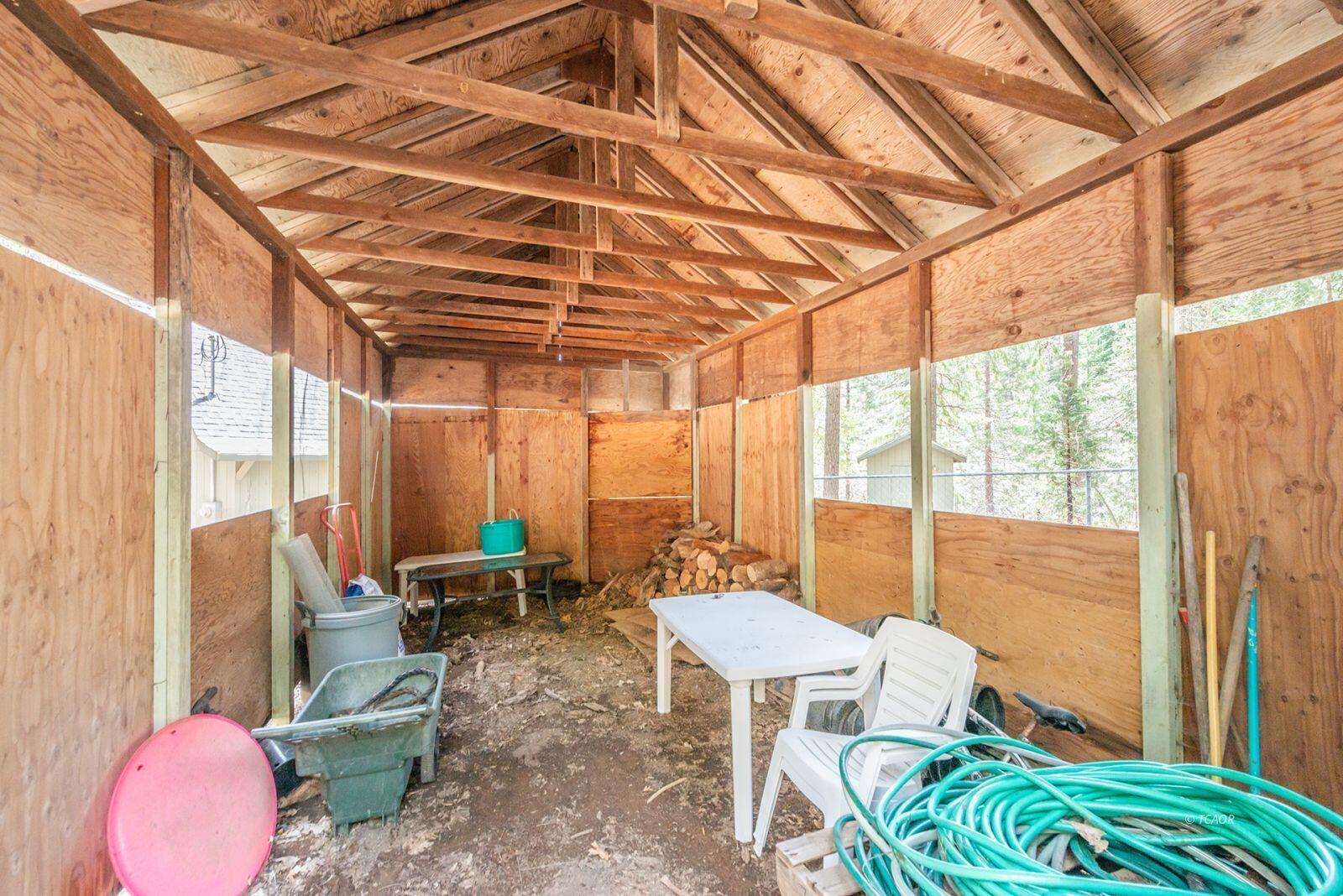 121-141 Mountain Aire Road Trinity Center, CA 96091 - Photo 50 of 51 a room with furniture and floor to ceiling windows
