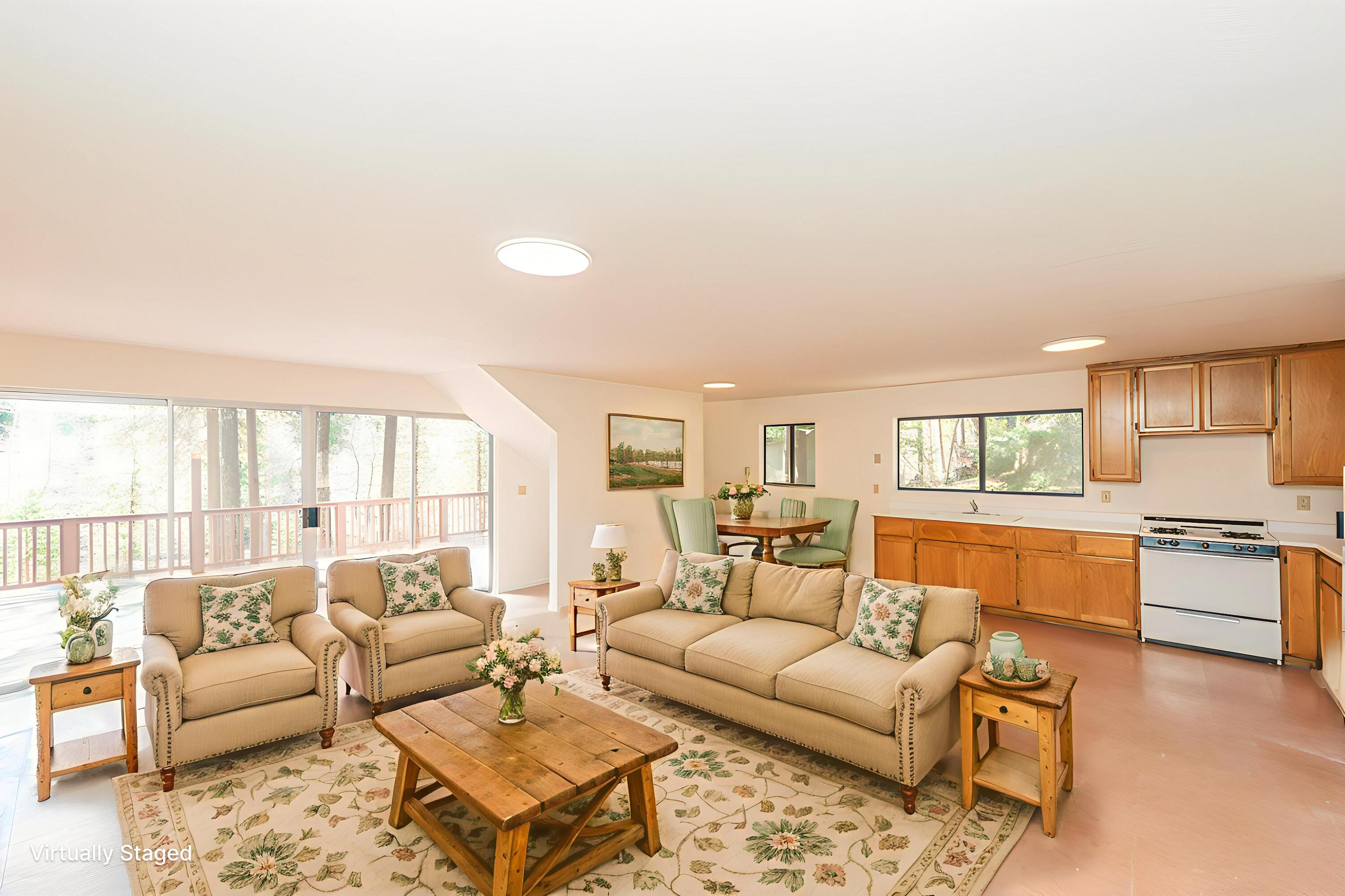 121-141 Mountain Aire Road Trinity Center, CA 96091 - Photo 7 of 34 a living room with furniture and a large window