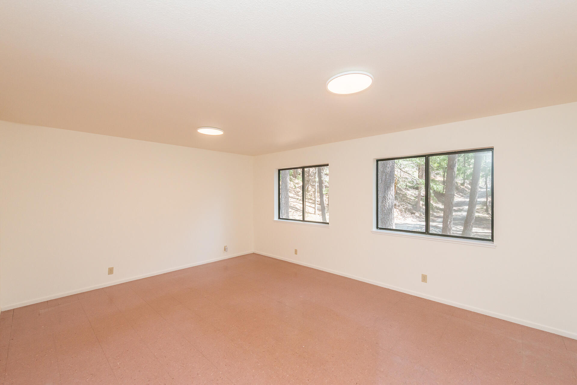 121-141 Mountain Aire Road Trinity Center, CA 96091 - Photo 8 of 34 an empty room with windows