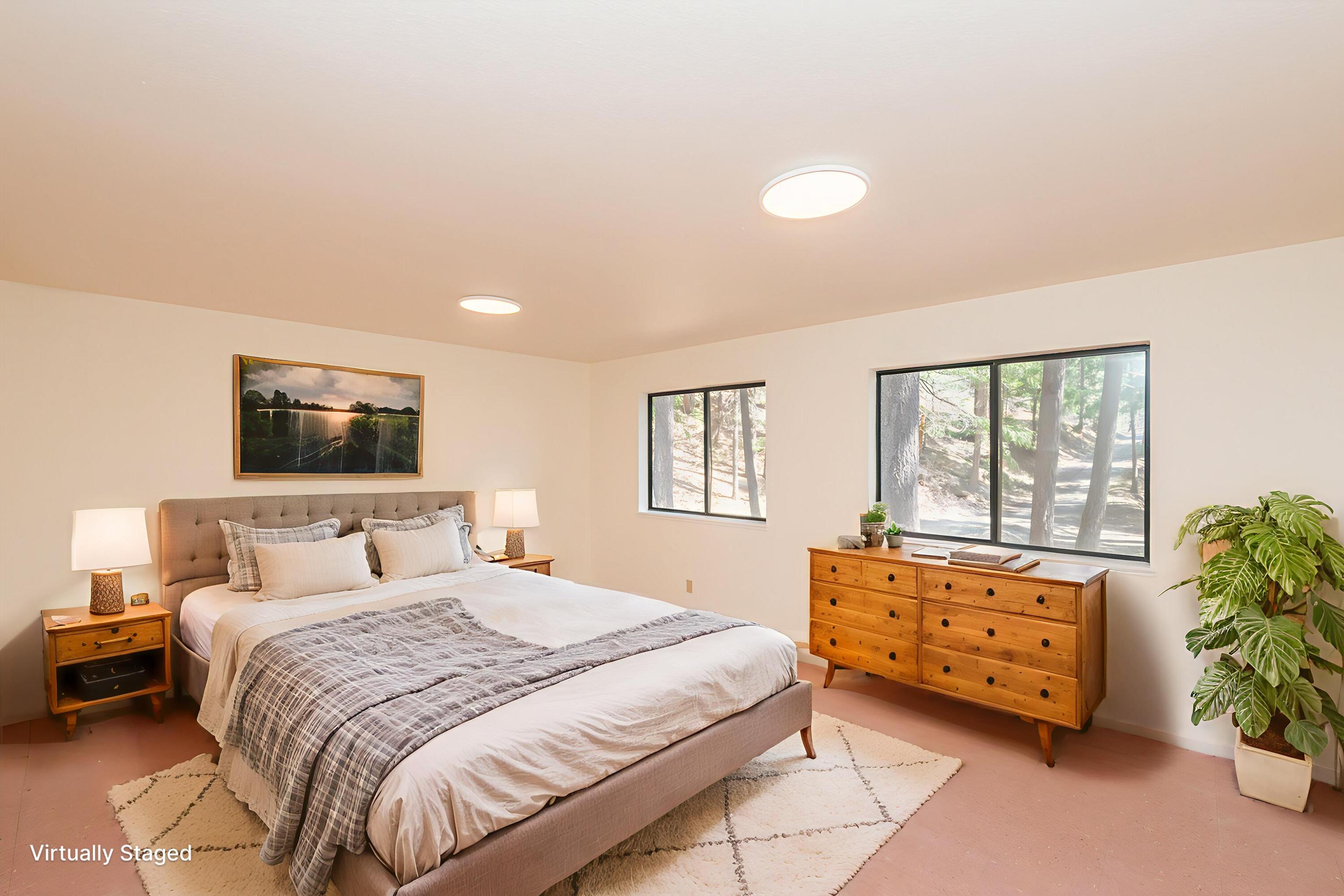 121-141 Mountain Aire Road Trinity Center, CA 96091 - Photo 9 of 34 a bedroom with a bed and a television