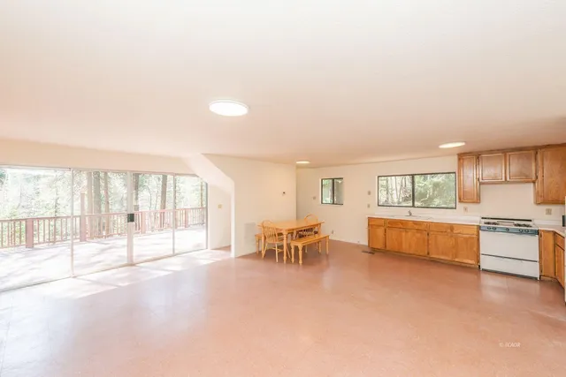 a large living room with a large window