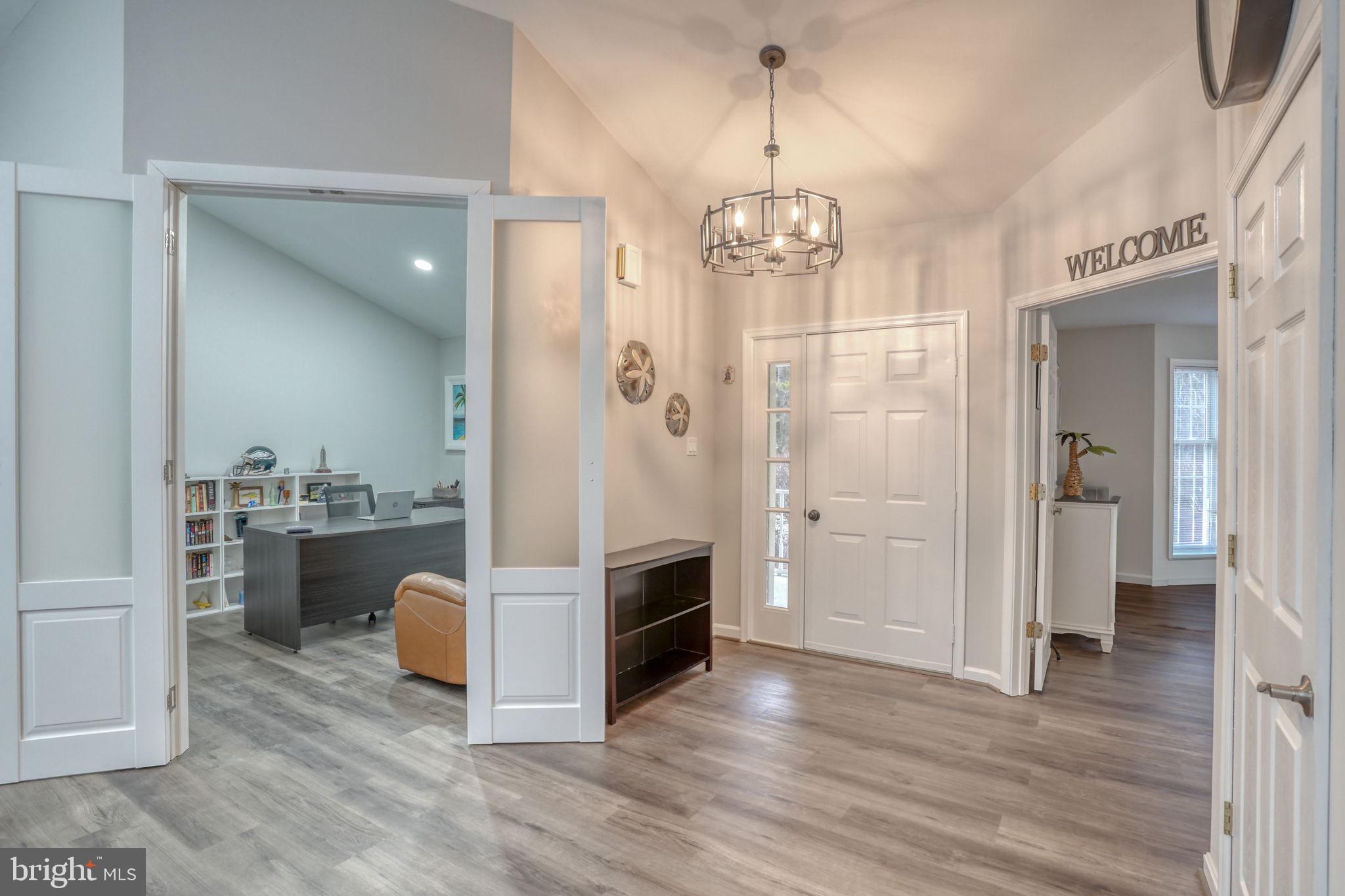 10821 Shawnee Road Harrington, DE 19952 - Photo 16 of 53 a spacious bathroom with a granite countertop sink mirror and shower
