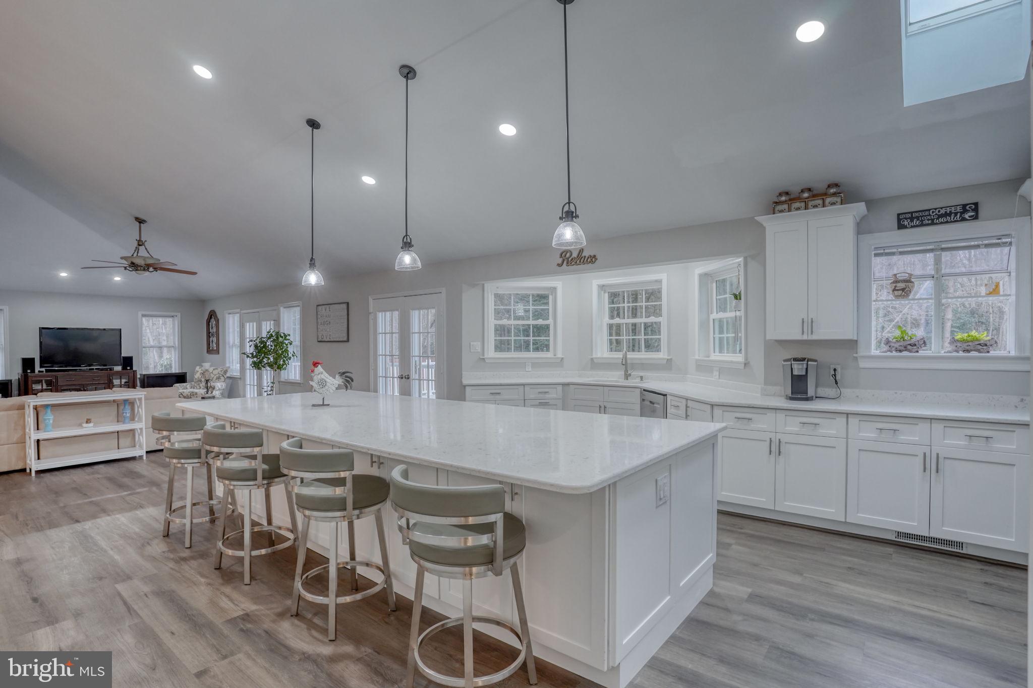 10821 Shawnee Road Harrington, DE 19952 - Photo 17 of 53 a large kitchen with lots of counter space and furniture