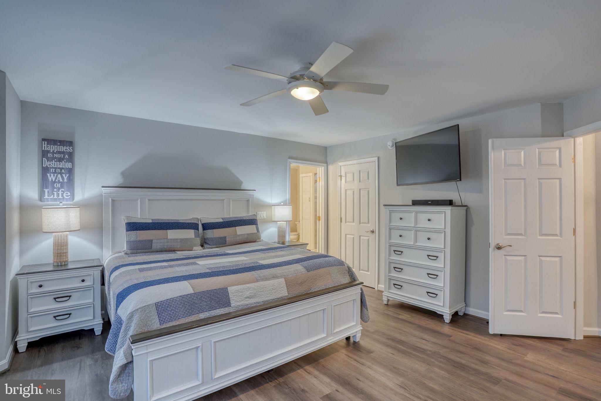 10821 Shawnee Road Harrington, DE 19952 - Photo 35 of 53 a bedroom with a bed and a television
