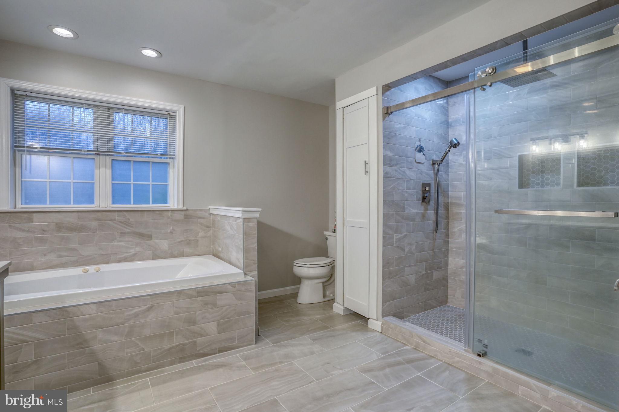 10821 Shawnee Road Harrington, DE 19952 - Photo 36 of 53 a bathroom with a bathtub and a shower