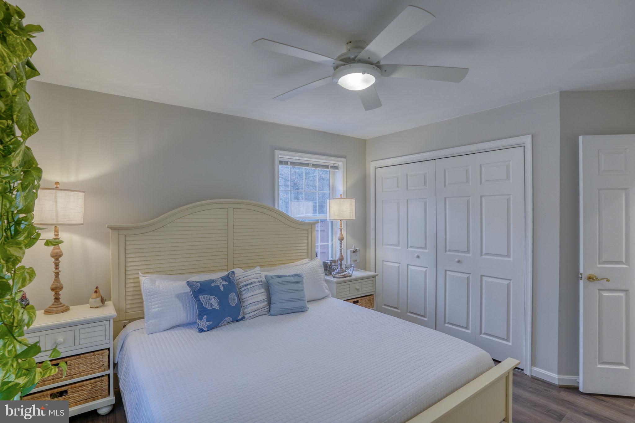 10821 Shawnee Road Harrington, DE 19952 - Photo 39 of 53 a large bed sitting in a bedroom next to a window